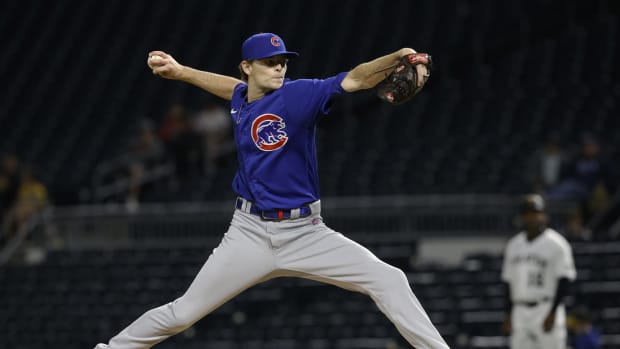Sep 29, 2021; Pittsburgh, Pennsylvania, USA; Chicago Cubs relief pitcher Codi Heuer (12) pitches against the Pittsburgh Pirates during the ninth inning at PNC Park. Chicago won 3-2.
